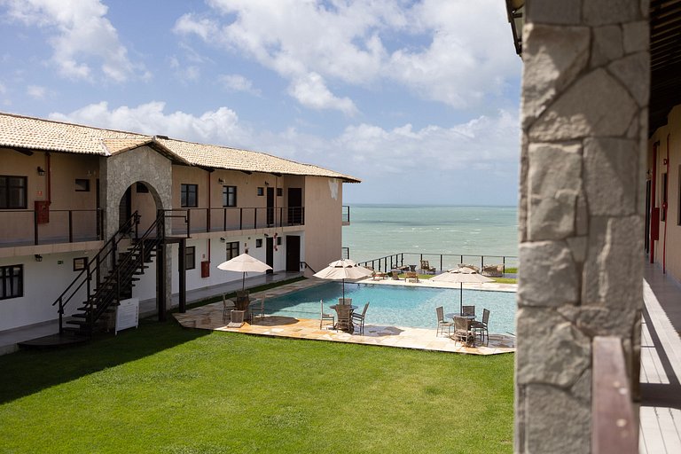 Varanda com vista para a mata e piscina Brisa da Mata